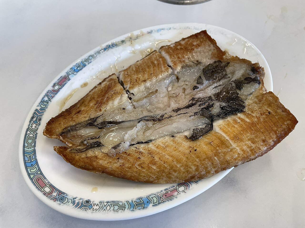 A Xing Shi Mu Yu (阿興虱目魚)